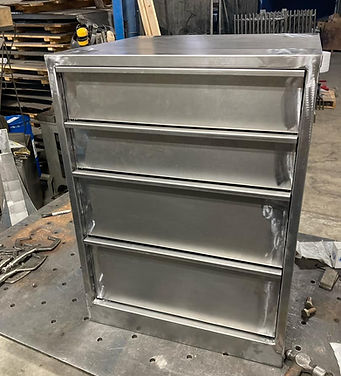Fabricated stainless cabinetry